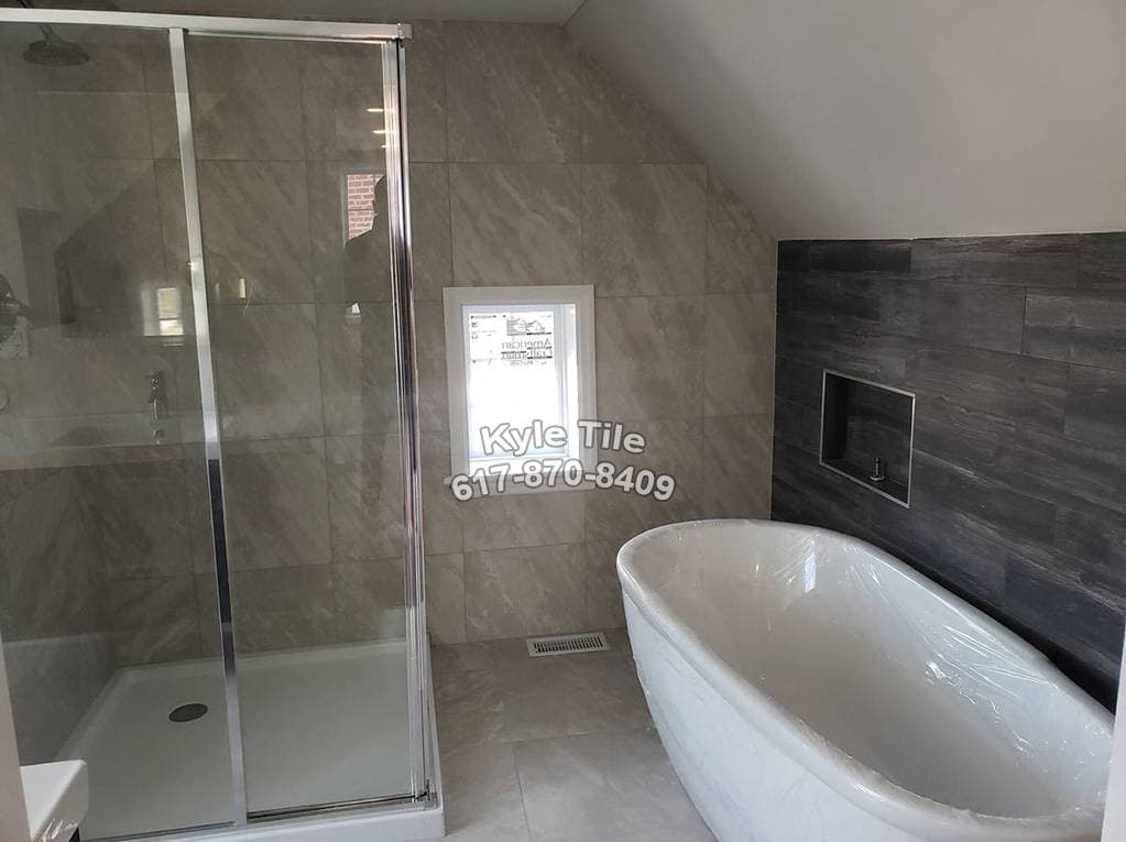 picture of a newly remodeled bathroom with freshly installed beige marble tile